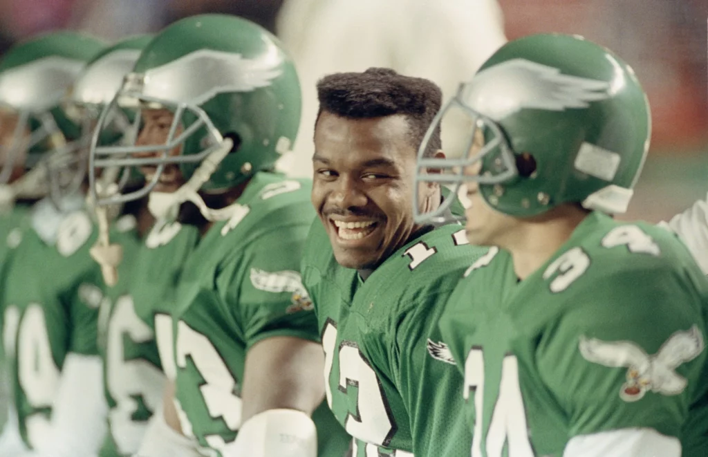 The Philladelphia Eagle's front man Randal Cunningham smiles at Eagles Team Mate, Kelly Green